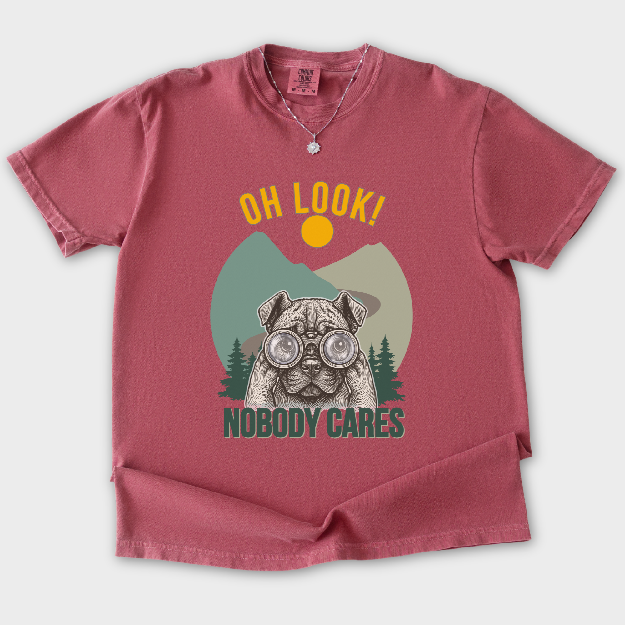 vintage-oh-look-nobody-cares-dog-graphic-comfort-colors-t-shirt-in-crimson - Crimson Flat Lay Front