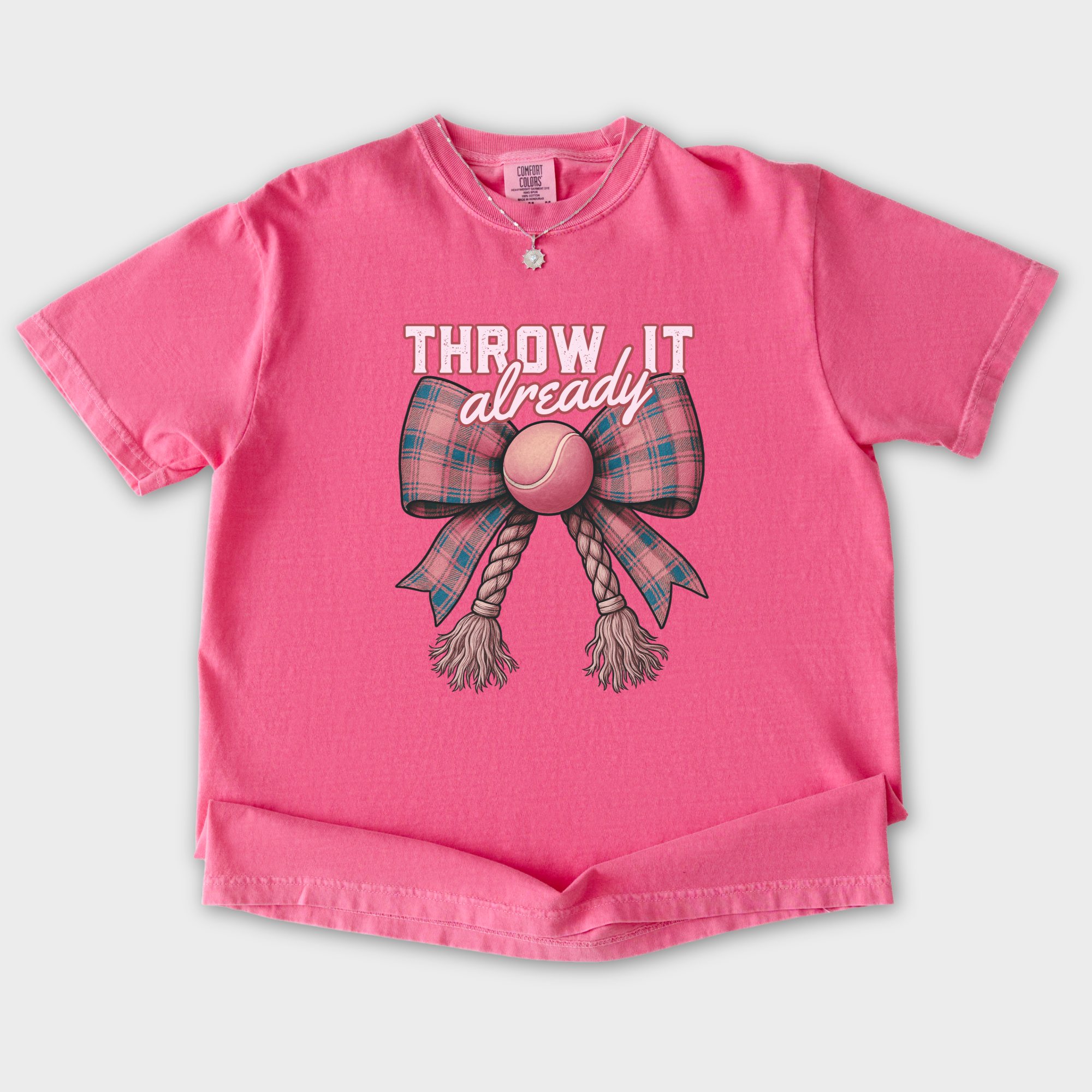 retro-throw-it-already-dog-chew-toy-bow-in-pink-dog-bow-comfort-colors-t-shirt-in-crunchberry - Crunchberry Flat Lay Front