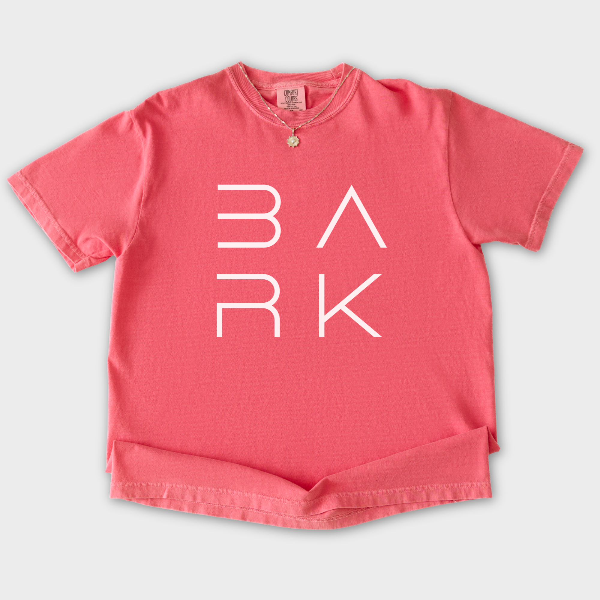 minimalist-bark-modern-text-design-dog-text-comfort-colors-t-shirt-in-watermelon - Watermelon Flat Lay Front