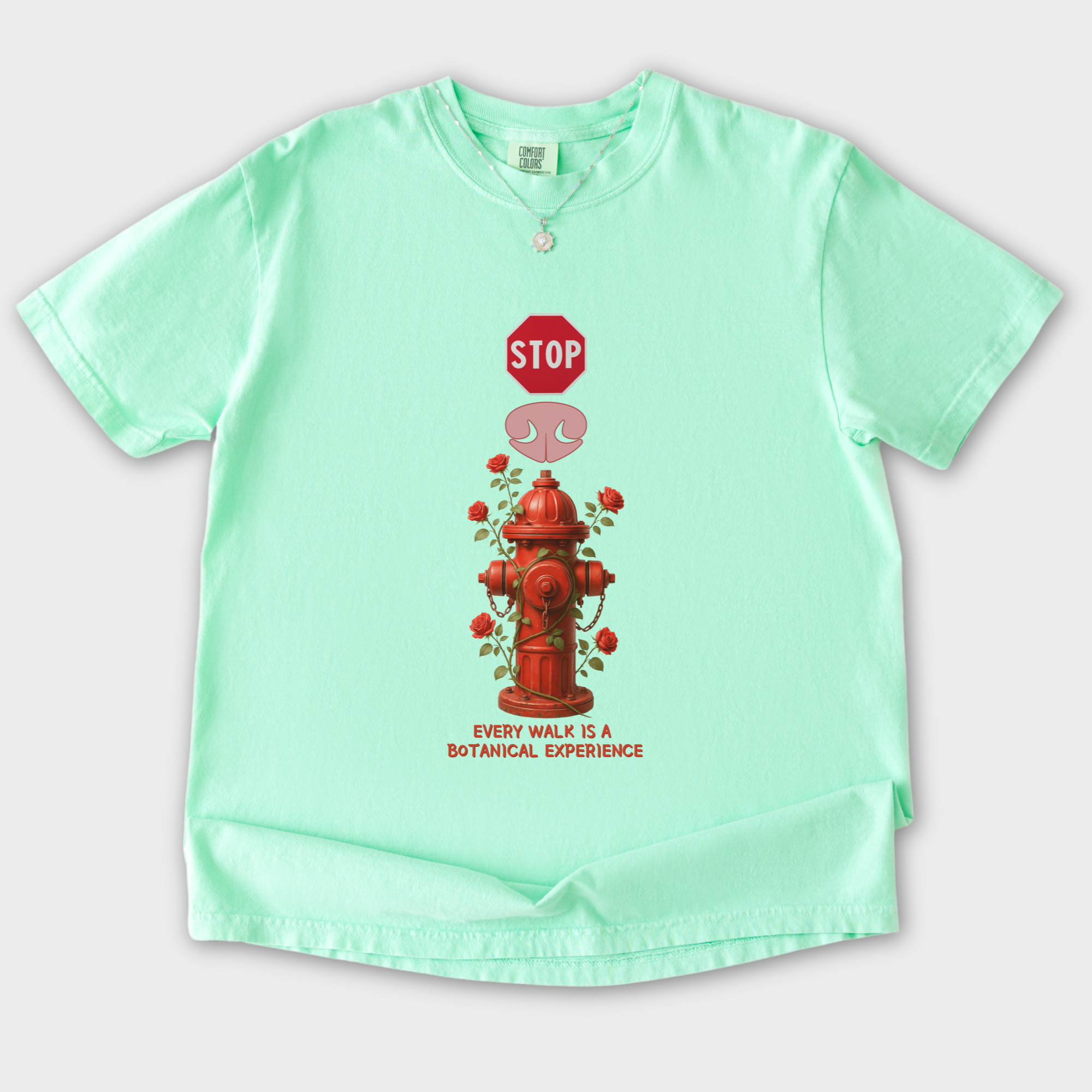 floral-every-walk-is-a-botanical-experience-dog-graphic-comfort-colors-t-shirt-in-island-reef - Island Reef Flat Lay Front