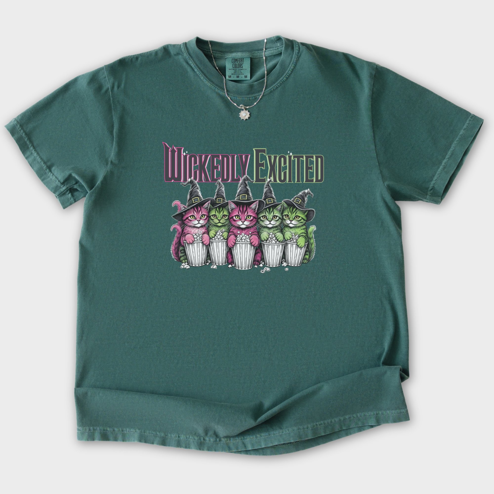 movie-inspired-wickedly-excited-movie-going-kitties-cat-graphic-comfort-colors-t-shirt-in-blue-spruce - Blue Spruce Flat Lay Front