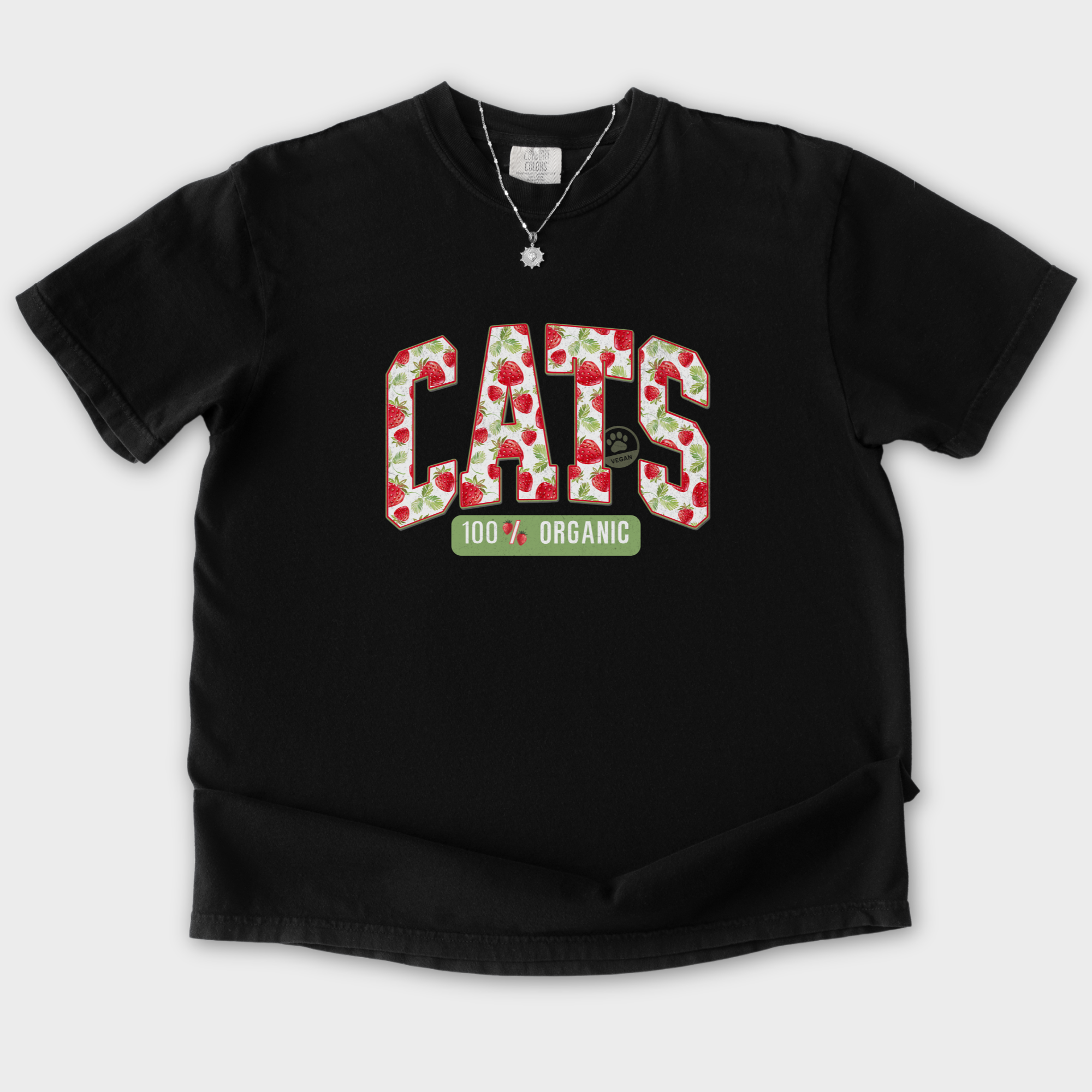 floral-vintage-strawberry-market-cats-organic-cat-text-comfort-colors-t-shirt-in-black - Black Flat Lay Front