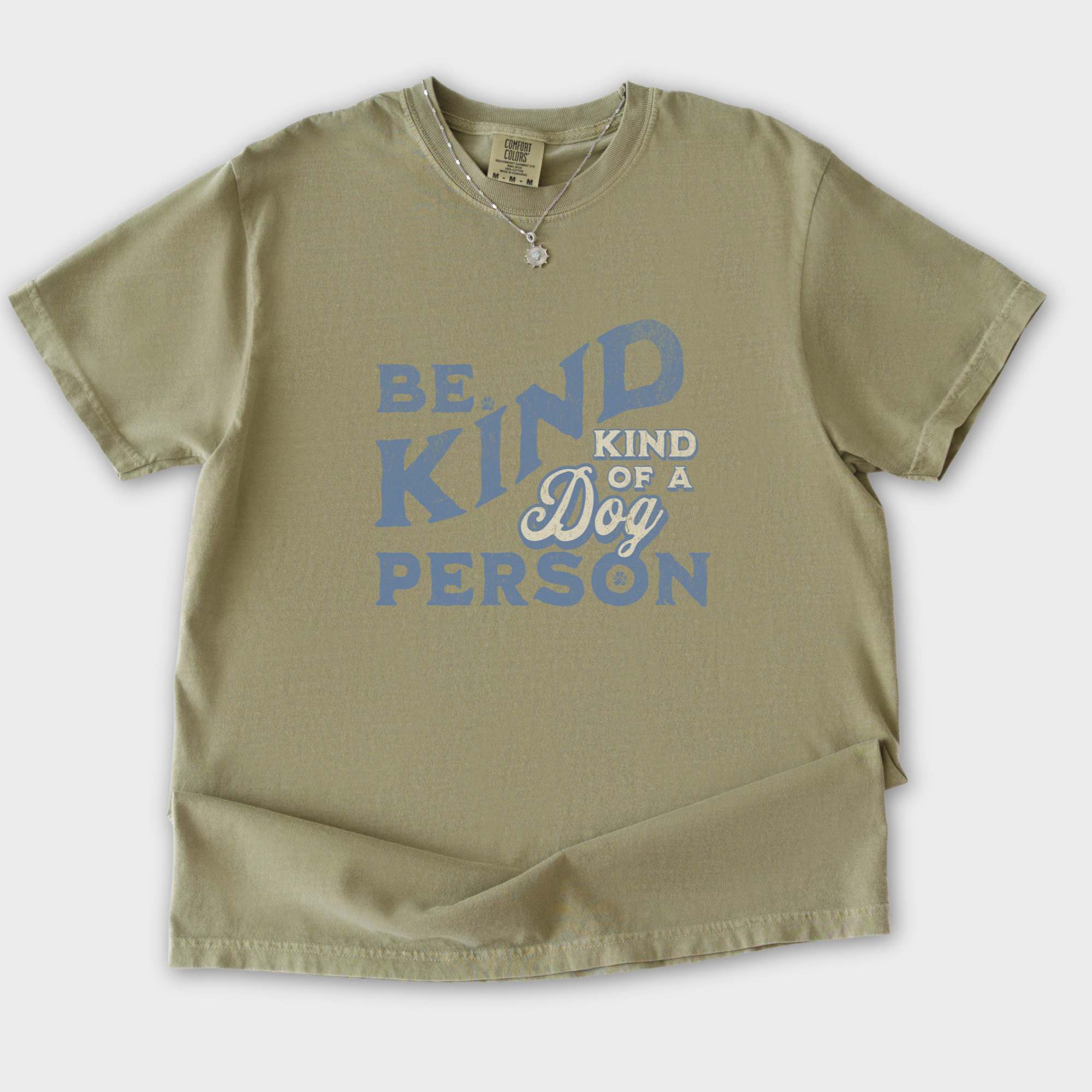 vintage-be-kind-of-a-dog-person-dog-text-comfort-colors-t-shirt-in-khaki - Khaki Flat Lay Front