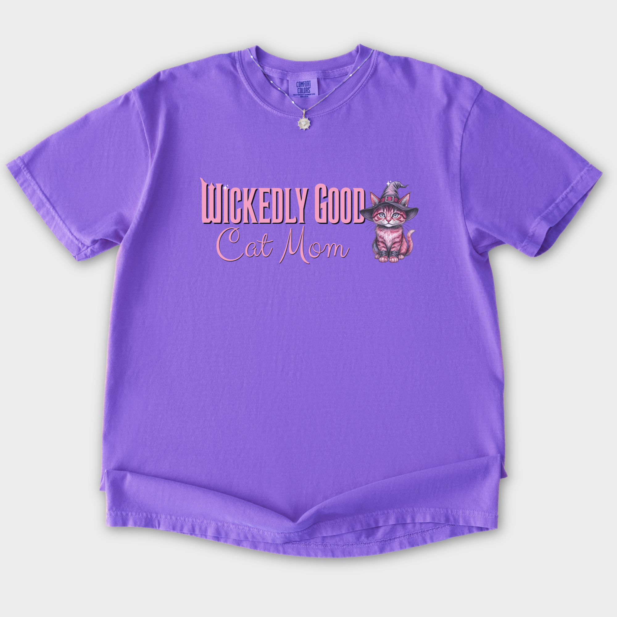 movie-inspired-pink-wickedly-good-cat-mom-cat-graphic-comfort-colors-t-shirt-in-violet - Violet Flat Lay Front