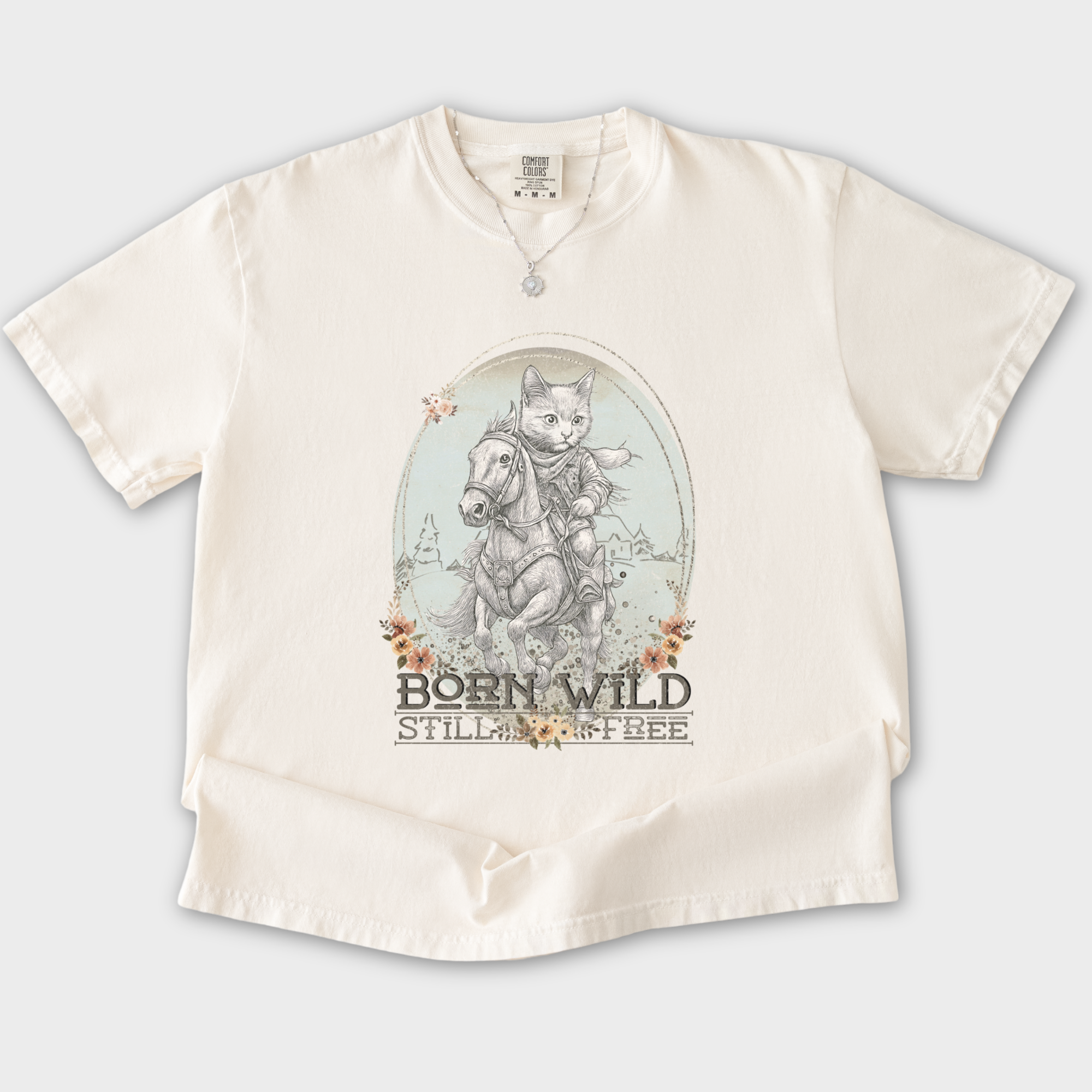 western-born-wild-still-free-gritty-kitty-cowboy-cat-line-art-comfort-colors-t-shirt-in-ivory - Ivory Flat Lay Front