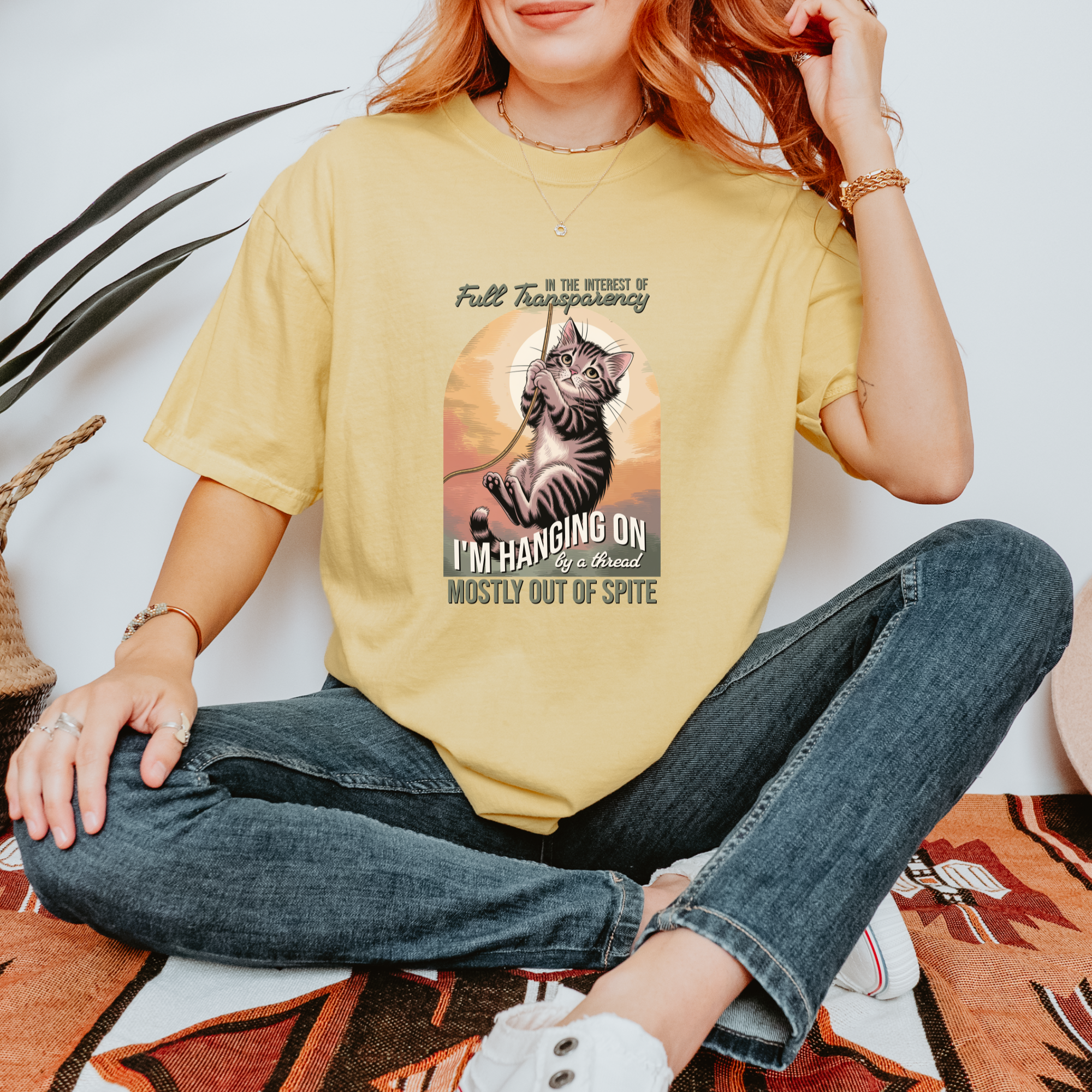 western-hanging-on-by-a-thread-cat-graphic-comfort-colors-t-shirt-in-butter - Butter Lifestyle Male Model